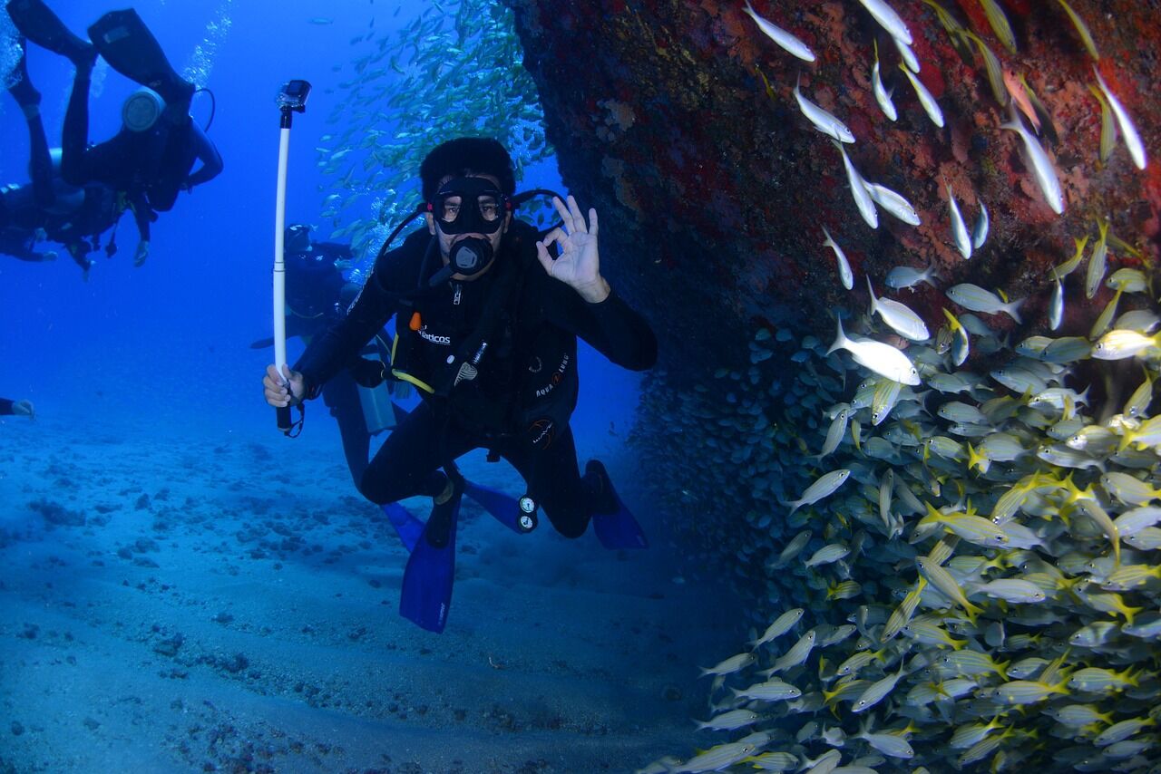 Unveiling the Abyss- Scuba Diving Across Generations